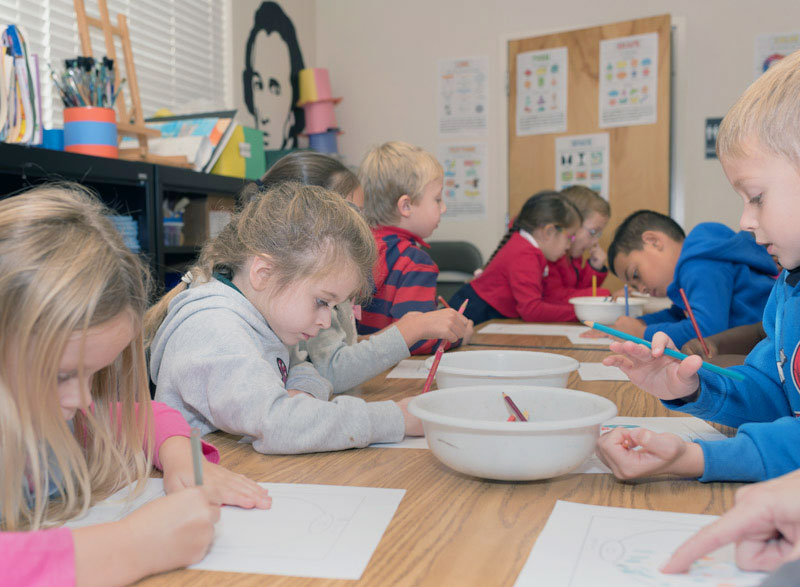 Charlotte Preparatory School students and staff learning and playing together