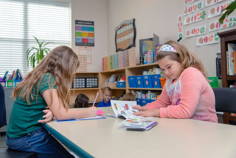 Charlotte Preparatory School students and staff learning and playing together