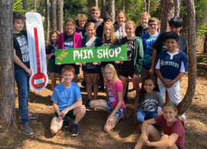 Charlotte Prep Students with Goal thermometere for the phin shop fundraiser